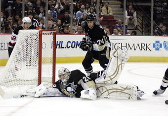 PITTSBURGH, PA - NOVEMBER 12:  Marc-Andre Fleury #29 of the Pittsburgh Penguins makes a save against the New Jersey Devils in the second period at Mellon Arena on November 12, 2009 in Pittsburgh, Pennsylvania.(Photo by Justin K. Aller/Getty Images)