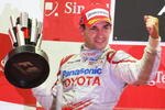 SINGAPORE - SEPTEMBER 27:  Timo Glock of Germany and Toyota celebrates on the podium after finishing second during the Singapore Formula One Grand Prix at the Marina Bay Street Circuit on September 27, 2009 in Singapore.  (Photo by Mark Thompson/Getty Images)