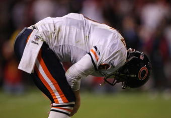 SAN FRANCISCO - NOVEMBER 12:  Jay Cutler #6 of the Chicago Bears stands on the field bent over against the San Francisco 49ers at Candlestick Park on November 12, 2009 in San Francisco, California. The 49ers won 10-6. (Photo by Jed Jacobsohn/Getty Images)