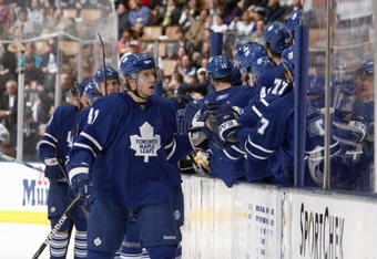 TORONTO - MARCH 28:  Nikolai Kulemin #41 of the Toronto Maple Leafs celebrates with teammates against the Boston Bruins during the NHL game at the Air Canada Centre March 28, 2009 in Toronto, Ontario. (Photo by: Dave Sandford/Getty Images)