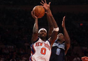 NEW YORK - NOVEMBER 09:  Larry Hughes #0 of the New York Knicks shoots the ball against Ronnie Brewer #9 of the Utah Jazz at Madison Square Garden on November 9, 2009 in New York City. NOTE TO USER: User expressly acknowledges and agrees that, by downloading and or using this photograph, User is consenting to the terms and conditions of the Getty Images License Agreement.  (Photo by Nick Laham/Getty Images)