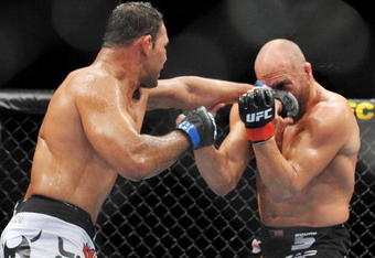 PORTLAND, OR - AUGUST 29:  UFC fighter Antonio Nogueira (L) battles UFC fighter Randy Couture (R) during their Heavyweight bout at UFC 102:  Couture vs. Nogueira at the Rose Garden Arena on August 29, 2009 in Portland, Oregon.  (Photo by Jon Kopaloff/Getty Images)