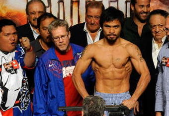 LAS VEGAS - NOVEMBER 13:  Manny Pacquiao weighs in for his upcoming bout against WBO welterweight champion Miguel Cotto at the MGM Grand Garden Arena on November 13, 2009 in Las Vegas, Nevada. Pacquiao and Cotto will meet in a WBO welterweight title fight at the MGM Grand on November 14.  Pacquiao weighed in at 144 pounds and Cotto weighed in at 145 pounds.  (Photo by Ethan Miller/Getty Images)