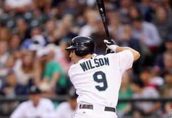 SEATTLE - AUGUST 12:  Jack Wilson #9 of the Seattle Mariners bats during the game against the Chicago White Sox on August 12, 2009 at Safeco Field in Seattle, Washington. (Photo by Otto Greule Jr/Getty Images) 