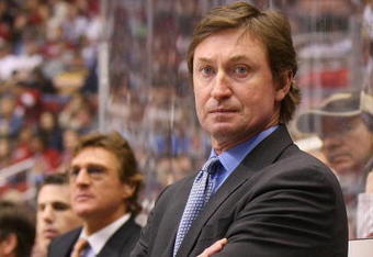 GLENDALE, AZ - FEBRUARY 28:  (FILE PHOTO) Head Coach Wayne Gretzky of the Phoenix Coyotes manages his team from behind the bench during his game against the St. Louis Blues on February 28, 2009 at the Jobing.com Arena in Glendale, Arizona. Gretzky announced on his website he resigned as the coach for the Phoenix Coyotes on September 24, 2009 in Glendale, Arizona. (Photo by Bruce Bennett/Getty Images)