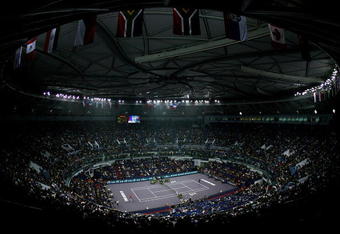 SHANGHAI, CHINA - NOVEMBER 16:  A general view as Novak Djokovic of Serbia serves to Nikolay Davydenko of Russia during the finals of the Tennis Masters Cup at Qi Zhong Stadium November 16, 2008 in Shanghai, China.  (Photo by Matthew Stockman/Getty Images)