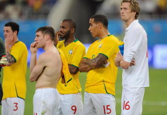 DOHA, QATAR - NOVEMBER 14: (L-R) Wayne Bridge, James Milner, Darren Bent, Tom Huddlestone and Peter Crouch of England look dejected after the International Friendly match between Brazil and England at the Khalifa Stadium on November 14, 2009 in Doha, Qatar.  (Photo by Michael Regan/Getty Images)
