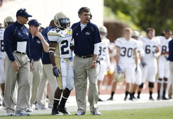 DURHAM, NC - NOVEMBER 14:  Head coach Paul Johnson of the Georgia Tech Yellow Jackets gives instructions to Embry Peeples #24 during the game against the Duke Blue Devils at Wallace Wade Stadium on November 14, 2009 in Durham, North Carolina. (Photo by Joe Robbins/Getty Images)