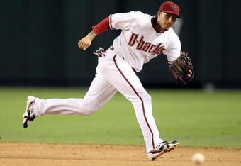 PHOENIX - JULY 08:  Infielder Felipe Lopez #2 of the Arizona Diamondbacks attempts to field a single hit by the San Diego Padres during the major league baseball game at Chase Field on July 8, 2009 in Phoenix, Arizona.  The Diamondbacks defeated the Padres 6-2.  (Photo by Christian Petersen/Getty Images)