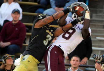 BOULDER, CO - NOVEMBER 07:  Wide receiver Jeff Fuller #8 of the Texas A&M Aggies makes a reception against the defense of Jimmy Smith #3 of the Colorado Buffaloes during NCAA college football action at Folsom Field on November 7, 2009 in Boulder, Colorado. Colorado defeated Texas A&M 35-34.  (Photo by Doug Pensinger/Getty Images)