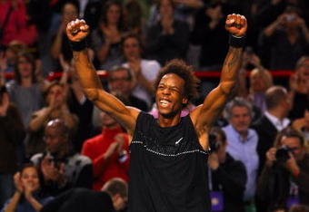 PARIS - NOVEMBER 14:  Gael Monfils of France celebrates match point during his semi final match against Radek Stepanek of Czech Republic at the ATP Masters Series at the Palais Omnisports De Paris-Bercy on November 14, 2009 in Paris, France.  (Photo by Clive Rose/Getty Images)