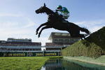 LIVERPOOL, ENGLAND - APRIL 04:  Black Apalachi ridden by Denis O'Regan jumps the water jump during the John Smith's Grand National Steeple Chase Handicap at Aintree on April 4, 2009 in Liverpool, England.  (Photo by Warren Little/Getty Images)