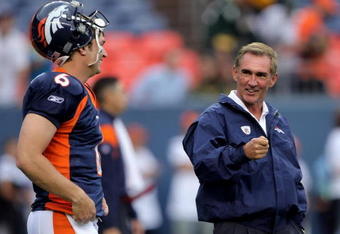 DENVER - AUGUST 22:  Head coach Mike Shanahan (R) of the Denver Broncos chats with quarterback Jay Cutler #6 during warm ups prior to facing the Green Bay Packers during NFL preseason action at Invesco Field on August 22, 2008 in Denver, Colorado.  (Photo by Doug Pensinger/Getty Images)