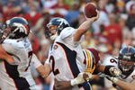 LANDOVER, MD - NOVEMBER 15:  Chris Simms #2 of the Denver Broncos passes under pressure during the game against the Washington Redskins at FedExField on November 15, 2009 in Landover, Maryland. The Redskins defeated the Broncos 27-17. (Photo by Larry French/Getty Images)