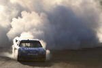AVONDALE, AZ - NOVEMBER 15:  Jimmie Johnson, driver of the #48 Lowe's Chevrolet, performs a burnout after winning the NASCAR Sprint Cup Series Checker O'Reilly Auto Parts 500 at Phoenix International Raceway on November 15, 2009 in Avondale, Arizona.  (Photo by Christian Petersen/Getty Images)