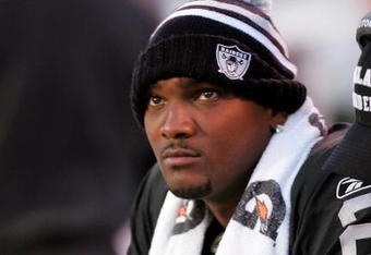 OAKLAND, CA - NOVEMBER 15:  JaMarcus Russell #2 of the Oakland Raiders sits on the bench after being taken out of their game against the Kansas City Chiefs at Oakland-Alameda County Coliseum on November 15, 2009 in Oakland, California.  (Photo by Ezra Shaw/Getty Images)