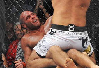 PORTLAND, OR - AUGUST 29:  UFC fighter Randy Couture (Bottom) battles UFC fighter Antonio Nogueira (Top) during their Heavyweight bout at UFC 102:  Couture vs. Nogueira at the Rose Garden Arena on August 29, 2009 in Portland, Oregon.  (Photo by Jon Kopaloff/Getty Images)