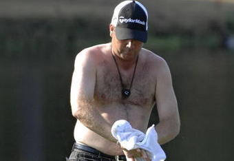 UNITED STATES - OCTOBER 26:  Doug Barron dries off after playing from a water hazard on the 16th hole during the first round of the 2006 Chrysler Championship Oct. 26 in Palm Harbor, Fl.  (Photo by Al Messerschmidt/Getty Images)