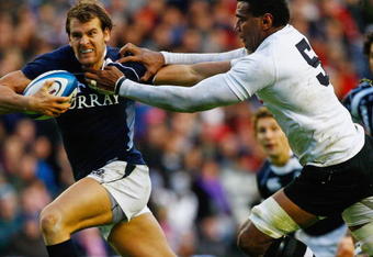 EDINBURGH, SCOTLAND - NOVEMBER 14:  Rory Lamont of Scotland is tackled by Iferemeimi Rawaqa of Fiji during the Bank of Scotland Corporate Autumn Tests at Murrayfield Stadium on November 14, 2009 in Edinburgh, Scotland.  (Photo by Jeff J Mitchell/Getty Images)