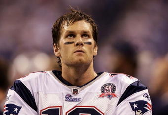 INDIANAPOLIS - NOVEMBER 15: Quarterback Tom Brady #12 of the New England Patriots watches from the sidelines in the fourth quarter of the game against the Indianapolis Colts at Lucas Oil Stadium on November 15, 2009 in Indianapolis, Indiana. The Colts won the game 35-34.  (Photo by Andy Lyons/Getty Images)