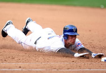 NEW YORK - APRIL 04:  Josh Thole #78 of the New York Mets dives back to first against the Boston Red Sox on April 4, 2009 at Citi Field in the Flushing neighborhood of the Queens borough of New York City. The Red Sox defeated the Mets 9-3.  (Photo by Jim McIsaac/Getty Images)
