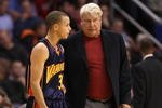 PHOENIX - OCTOBER 30:  Stephen Curry #30 of the Golden State Warriors talks with head coach Don Nelson during the NBA game against the Phoenix Suns at US Airways Center on October 30, 2009 in Phoenix, Arizona. The Suns defeated the Warriors 123-101.  NOTE TO USER: User expressly acknowledges and agrees that, by downloading and or using this photograph, User is consenting to the terms and conditions of the Getty Images License Agreement.  (Photo by Christian Petersen/Getty Images)