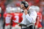 COLUMBUS, OH - NOVEMBER 14:  Head coach Jim Tressel of the Ohio State Buckeyes checks his notes as the Buckeyes play the Iowa Hawkeyes at Ohio Stadium on November 14, 2009 in Columbus, Ohio.  (Photo by Jamie Sabau/Getty Images)