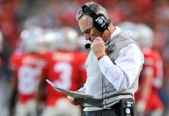 COLUMBUS, OH - NOVEMBER 14:  Head coach Jim Tressel of the Ohio State Buckeyes checks his notes as the Buckeyes play the Iowa Hawkeyes at Ohio Stadium on November 14, 2009 in Columbus, Ohio.  (Photo by Jamie Sabau/Getty Images)
