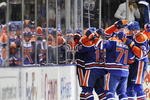 EDMONTON, AB - OCTOBER 3:  Gilbert Brule celebrates his goal with teammates (L-R) Andrew Cogliano, Lubomir Visnovsky, Ladislav Smid and Dustin Penner against the Calgary Flames in the second period during an NHL game on October 3, 2009 at Rexall Arena in Edmonton, Canada. L(Photo by Jimmy Jeong/Getty Images)