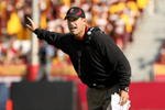 LOS ANGELES, CA - NOVEMBER 14:  Head coach Jim Harbaugh of the Stanford Cardinal signals during the game with the USC Trojans on November 14, 2009 at the Los Angeles Coliseum in Los Angeles, California.  Stanford won 55-21.  (Photo by Stephen Dunn/Getty Images)