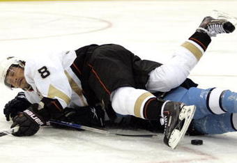 PITTSBURGH, PA - NOVEMBER 16:  Teemu Selanne #8 of the Anaheim Ducks is tripped up against the Pittsburgh Penguins in the second period at Mellon Arena on November 16, 2009 in Pittsburgh, Pennsylvania.  (Photo by Justin K. Aller/Getty Images)