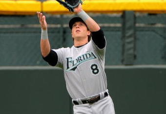 DENVER - MAY 10:  Left fielder Chris Coghlan #8 of the Florida Marlins fields a ball against the Colorado Rockies during MLB action at Coors Field on May 10, 2009 in Denver, Colorado. The Rockies defeated the Marlins 3-2.  (Photo by Doug Pensinger/Getty Images)