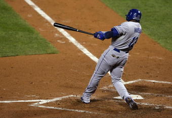 PHILADELPHIA - OCTOBER 21:  Orlando Hudson #13 of the Los Angeles Dodgers connects for a home run in the fifth inning against the Philadelphia Phillies in Game Five of the NLCS during the 2009 MLB Playoffs at Citizens Bank Park on October 21, 2009 in Philadelphia, Pennsylvania.  (Photo by Nick Laham/Getty Images)
