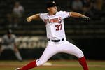 PHOENIX - OCTOBER 16:  Washington Nationals prospect Stephen Strasburg #37, playing for the Phoenix Desert Dogs, pitches in the Arizona Fall League game against the Scottsdale Scorpions at Phoenix Municipal Stadium on October 16, 2009 in Phoenix, Arizona.  (Photo by Christian Petersen/Getty Images)