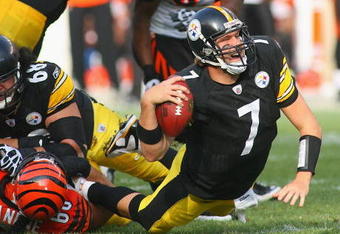 PITTSBURGH - NOVEMBER 15: Ben Roethlisberger #7 of the Pittsburgh Steelers is sacked by Jonathan Fanene #68 of the Cincinnati Bengals at Heinz Field on November 15, 2009 in Pittsburgh, Pennsylvania.  (Photo by Rick Stewart/Getty Images)