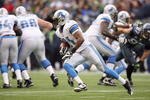 SEATTLE - NOVEMBER 08:  Aaron Brown #21 of the Detroit Lions carries the ball during the game against the Seattle Seahawks on November 8, 2009 at Qwest Field in Seattle, Washington. The Seahawks defeated the Lions 32-20. (Photo by Otto Greule Jr/Getty Images)