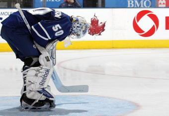 TORONTO - NOVEMBER 10: Jonas Gustavsson #50 of the Toronto Maple Leafs pauses during the end of his 5-2 loss to the Minnesota Wild at the Air Canada Centre on November 10, 2009 in Toronto, Ontario, Canada.  (Photo by Bruce Bennett/Getty Images)