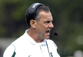 ORLANDO, FL - JANUARY 1: Coach Mark Dantonio of the Michigan State Spartans directs play against the Georgia Bulldogs at the 2009 Capital One Bowl at the Citrus Bowl on January 1, 2009 in Orlando, Florida.  (Photo by Al Messerschmidt/Getty Images) 
