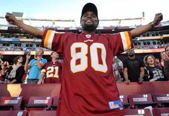 LANDOVER, MD - NOVEMBER 15:  A fan of the Washington Redskins celebrates his team's win against the Denver Broncos at FedExField on November 15, 2009 in Landover, Maryland. The Redskins defeated the Broncos 27-17. (Photo by Larry French/Getty Images)