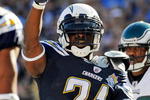 SAN DIEGO - NOVEMBER 15:  LaDainian Tomlinson #21 of the San Diego Chargers celebrates his rushing touchdown against Philadelphia Eagles during the NFL football game at Qualcomm Stadium on November 15, 2009 in San Diego, California.  (Photo by Kevork Djansezian/Getty Images)