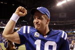 INDIANAPOLIS - NOVEMBER 15: Quarterback Peyton Manning #18 of the Indianapolis Colts celebrates his teams 35-34 victory over the New England Patriots after the game at Lucas Oil Stadium on November 15, 2009 in Indianapolis, Indiana.  (Photo by Andy Lyons/Getty Images)