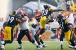 PITTSBURGH - NOVEMBER 15: Tyrone Carter #23 of the Pittsburgh Steelers jumps in toward Carson Palmer #9 of the Cincinnati Bengals  at Heinz Field on November 15, 2009 in Pittsburgh, Pennsylvania. The Bengals won 18-12. (Photo by Rick Stewart/Getty Images)