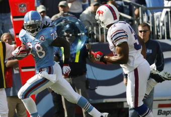 NASHVILLE, TN - NOVEMBER 15: Chris Johnson #28 of the Tennessee Titans breaks free from Jairus Byrd #31 of the Buffalo Bills for a touchdown in their NFL game at LP Field on November 15, 2009 in Nashville, Tennessee.    (Photo by John Sommers II/Getty Images)