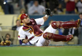 LOS ANGELES, CA - MARCH 21:  Catcher Ramon Hernandez #19 of Venezuela reacts after failing to tag out Tae Kyun Kim #52 of Korea in the sixth of the semifinal game of the 2009 World Baseball Classic on March 21, 2009 at Dodger Stadium in Los Angeles, California.  (Photo by Stephen Dunn/Getty Images)