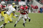 COLUMBUS- NOVEMBER 23:  Maurice Clarett #13 of Ohio State runs against Michigan on November 23, 2002 at Ohio Stadium in Columbus, Ohio.  Ohio State won the game  14-9.  (Photo by Tom Pidgeon/Getty Images)
