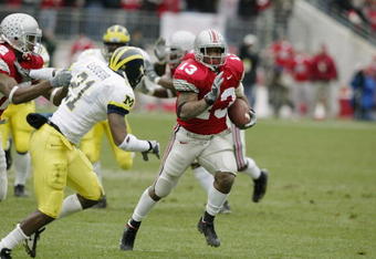 COLUMBUS- NOVEMBER 23:  Maurice Clarett #13 of Ohio State runs against Michigan on November 23, 2002 at Ohio Stadium in Columbus, Ohio.  Ohio State won the game  14-9.  (Photo by Tom Pidgeon/Getty Images)
