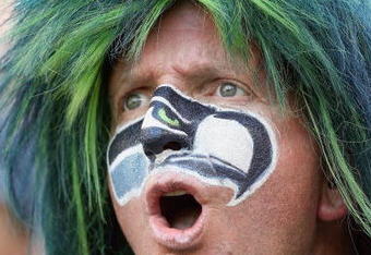 SEATTLE , WA - SEPTEMBER 13: A fan of the Seattle Seahawks watches the action during the game against the St. Louis Rams at Qwest Field on September 13, 2009 in Seattle, Washington. (Photo by Otto Greule Jr/Getty Images)