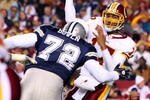LANDOVER, MD - NOVEMBER 16:  Jason Campbell #17 of the Washington Redskins attempts to get off a pass under pressure from Stephen Bowen #72 of the Dallas Cowboys during their game on November 16, 2008 at FedEx Field in Landover, Maryland.  (Photo by Jim McIsaac/Getty Images)