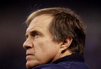 INDIANAPOLIS - NOVEMBER 15:  Head coach Bill Belichick of the New England Patriots looks on during warm ups before the game against the Indianapolis Colts at Lucas Oil Stadium on November 15, 2009 in Indianapolis, Indiana. (Photo by Andy Lyons/Getty Images)