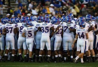 BOULDER, CO - OCTOBER 17: The Kansas Jayhawks huddle up prior to the game against the Colorado Buffaloes at Folsom Field on October 17, 2009 in Boulder, Colorado. (Photo by Garrett W. Ellwood/Getty Images)